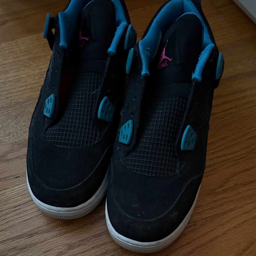Black, pink, and teal Jordan’s